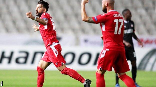 Jordi Gomez celebrates his long-range goal