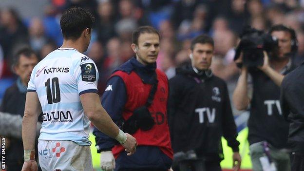 Dan Carter goes off injured on Saturday in Lyon