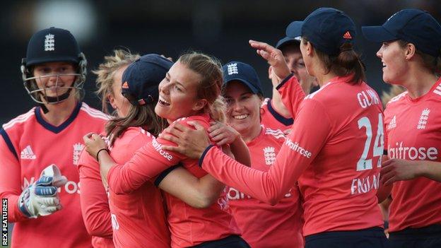 Debutant Alex Hartley, centre, is a leg-break bowler who was born in Blackburn