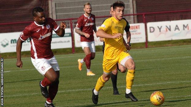 Airdrieonians winger Thomas Robert (right)