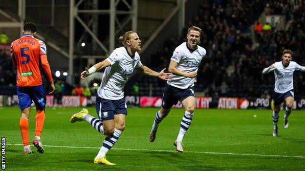 Brad Potts celebrates after scoring his third goal of the season