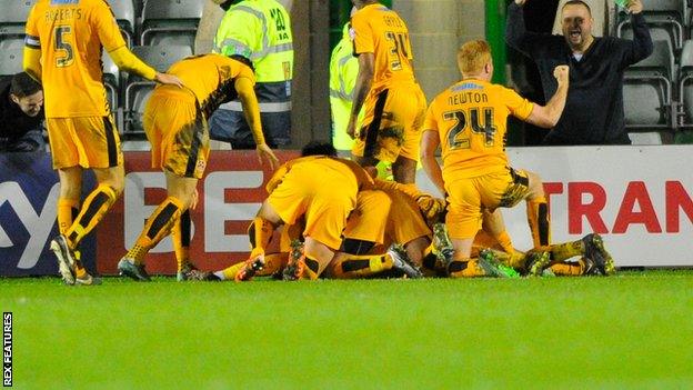 Cambridge United celebrate their late winner