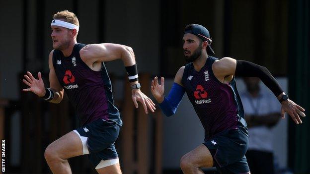 England bowlers Stuart Broad (left) and Saqib Mahmood (right) sprint during training in Sri Lanka