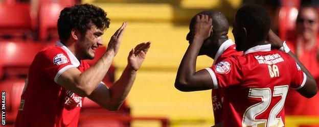 Tony Watt (left) celebrates his goal for Charlton against QPR