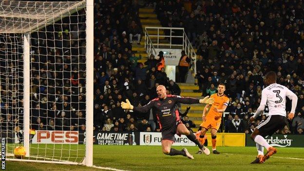 Fulham Ryan Sessegnon (right) taps in