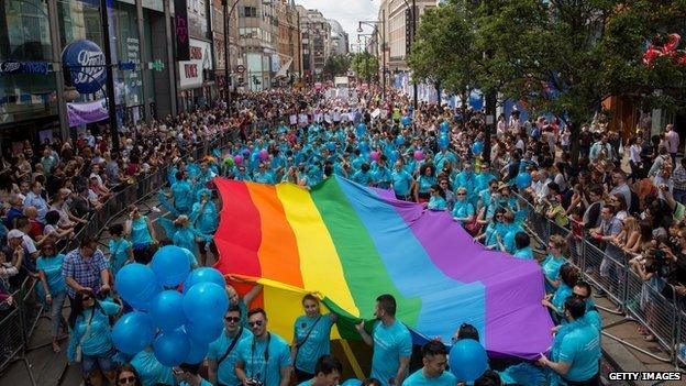 Members of the Lesbian, Gay, Bisexual and Transgender (LGBT) community take part in the Pride Parade in London