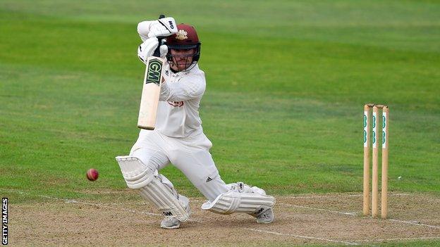 Surrey opener Rory Burns plays a cover drive