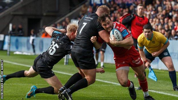 Scarlets wing Ryan Conbeer scored a hat-trick in a losing cause