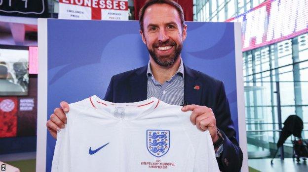 England boss Gareth Southgate with his own England shirt and legacy number - 1071