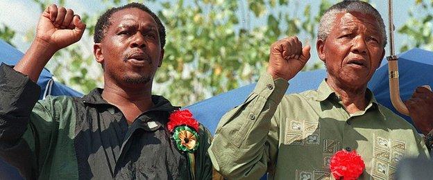 Tokyo Sexwale, left, alongside Nelson Mandela at a peace rally in South Africa in 1994