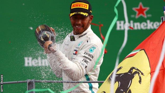 Lewis Hamilton celebrates winning the Italian Grand Prix