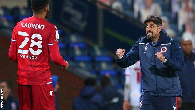 Josh Laurent and Veljko Paunovic celebrate Reading's victory at Blackburn