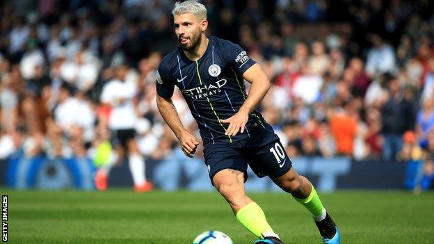 Sergio Aguero in action for Manchester City at Fulham