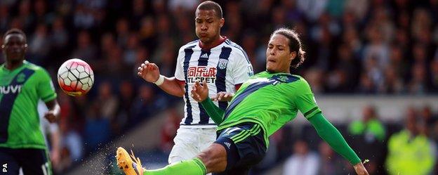 Virgil van Dijk (right) in action for Southampton against West Brom