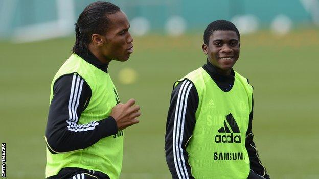 Didier Drogba (left) with Jeremie Boga at a Chelsea training session in March 2012