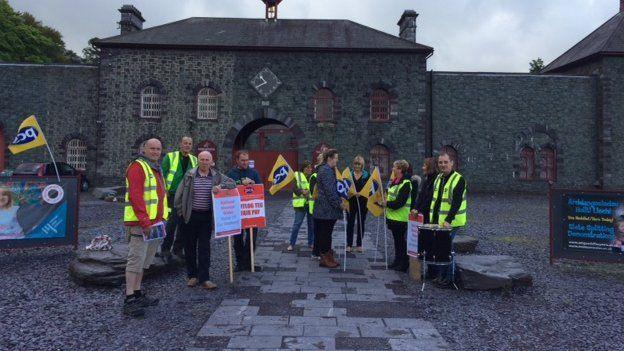 A small gathering outside the National Slate Museum in Llanberis, Gwynedd, in August