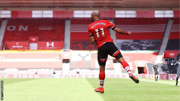 Nathan Redmond of Southampton celebrates after putting his team 3-2 up during the Premier League match between Southampton and Burnley at St Mary's Stadium on April 04, 2021
