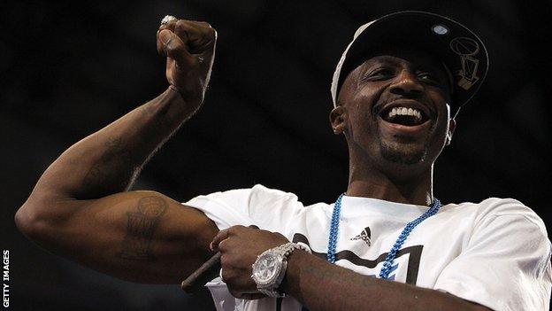 Jason Terry of the Dallas Mavericks shows off his NBA trophy tattoo after the Dallas Mavericks Victory Parade on June 16