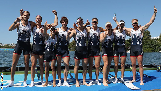 Team GB's men's eight celebrate on the podium after winning gold at Rio 2016