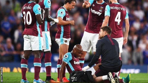 Andre Ayew (left)