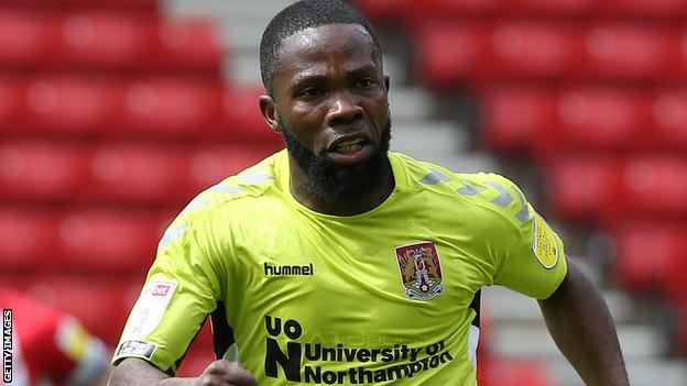 Mark Marshall in action for Northampton Town