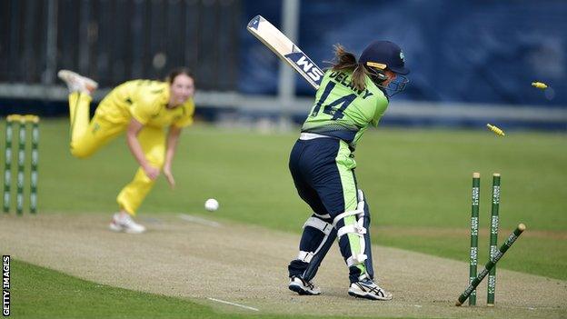 Australia's Darcie Brown bowls LauraDelany in Sunday's T20 encounter
