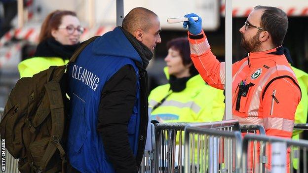 Staff had their temperatures checked on their way into the ground