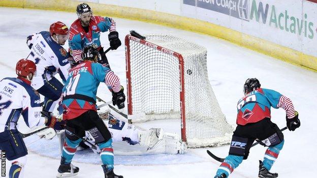 Brendan Connolly (right) scores for the Giants against the Capitals in Friday night's league game