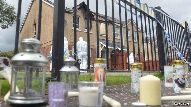 Mourners have left candles and other tributes outside Jennifer Dornan's home as the investigation continues