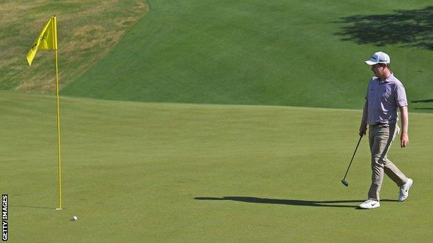 Robert MacIntyre looks at his ball on the 18th green in the WGC Matchplay