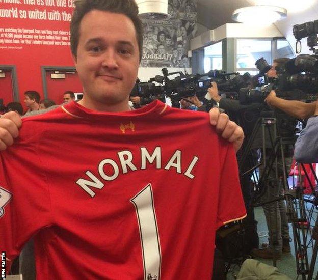 Norwegian journalist with Normal 1 shirt