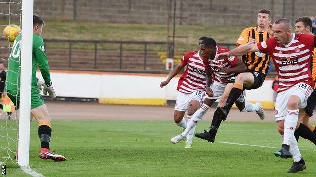 Mickel Miller (fourth right) scores his second goal on his way to a hat-trick for Hamilton Academical