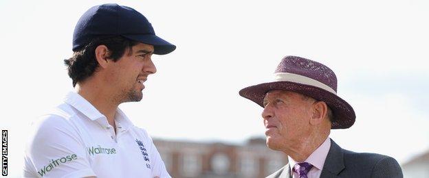 Alastair Cook with Geoffrey Boycott in 2013