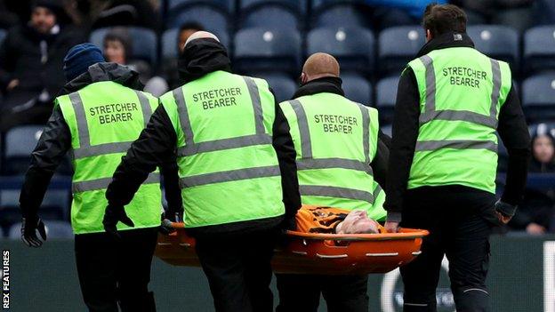 Tom Eaves is stretchered off