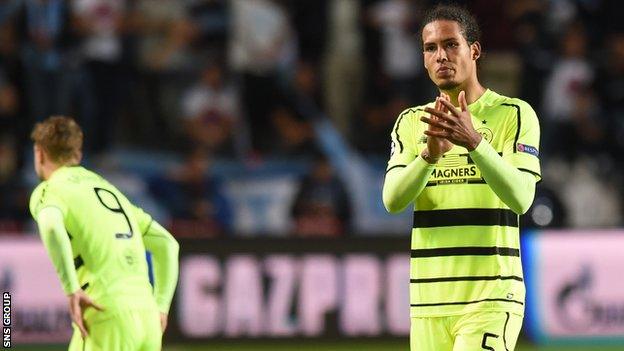 Virgil van Dijk applauds Celtic fans after the 2-0 defeat in Malmo