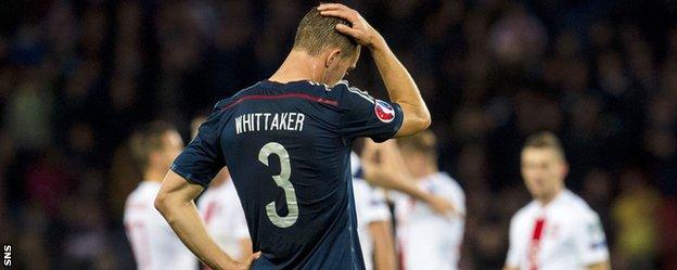 Scotland full-back Steven Whittaker shows his disappointment against Poland