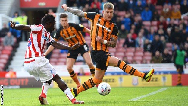 Stoke forward Mame Biram Diouf shoots at goal against Hull