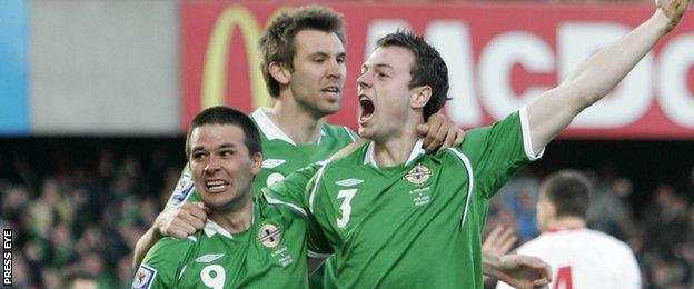 Jonny Evans and David Healy