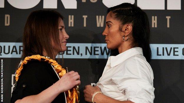 Katie Taylor stares at Amanda Serrano