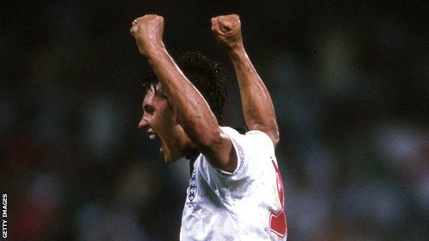 Lineker celebrates scoring a penalty against Cameroon