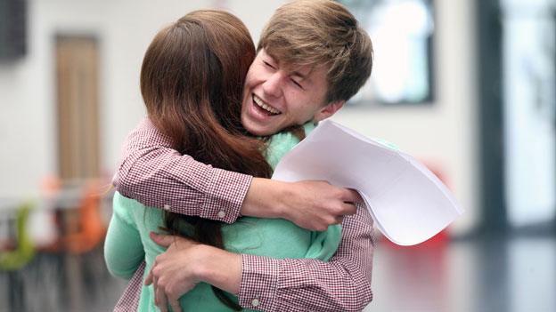 Andrew Williams (off to Oxford) hugging a friend at Coleg y Cymoedd, Nantgarw.