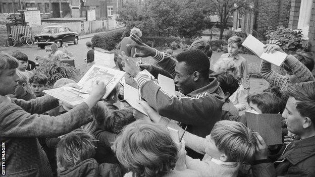 Pele is mobbed in Lymm, Cheshire, 1966.