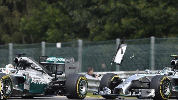 Lewis Hamilton and Nico Rosberg collide at twh 2014 Belgain Grand Prix