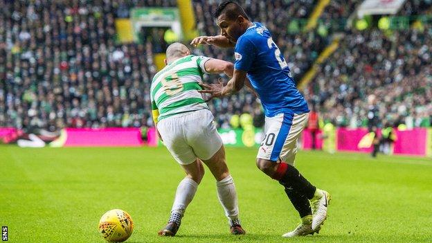 Scott Brown and Alfredo Morelos contest possession in a league match between Celtic and Rangers