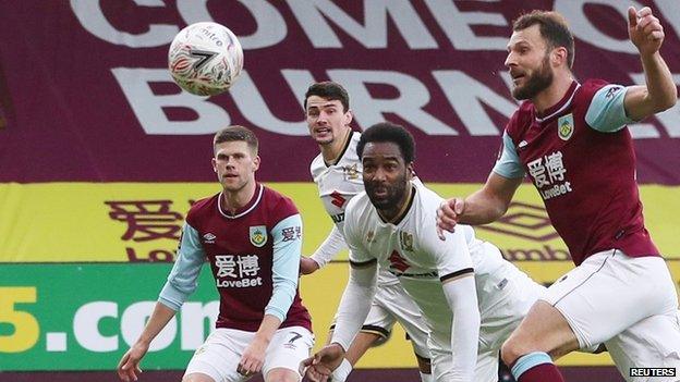 Cameron Jerome heads MK Dons in front against Burnley at Turf Moor