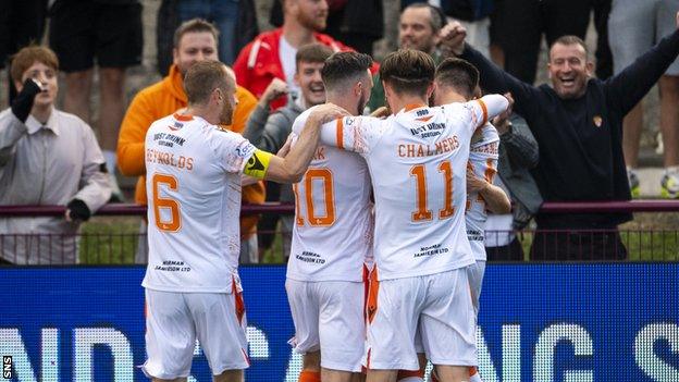 Dundee United players celebrate