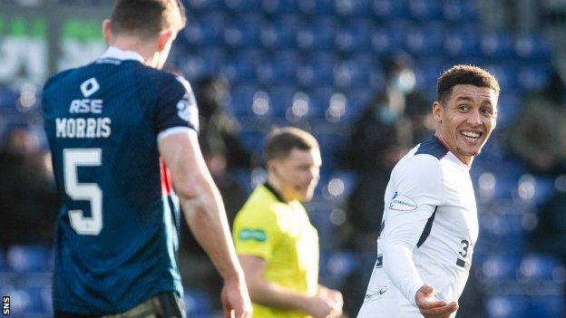 Rangers captain James Tavernier (right) celebrates