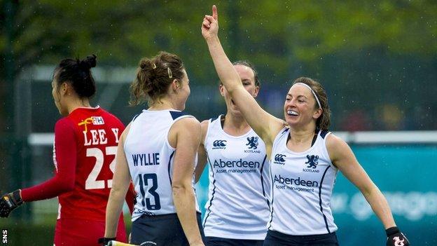 Linda Clement celebrates scoring against Korea at Glasgow Green