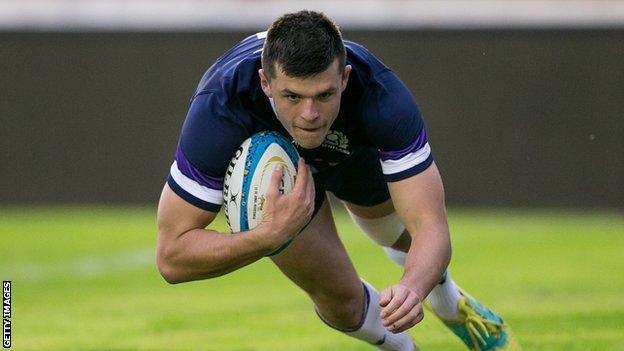 Blair Kinghorn dives over to score a try for Scotland