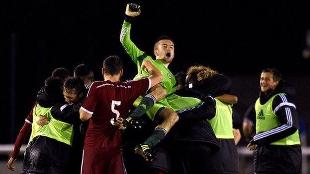 Wales celebrate victory in their opening game against England